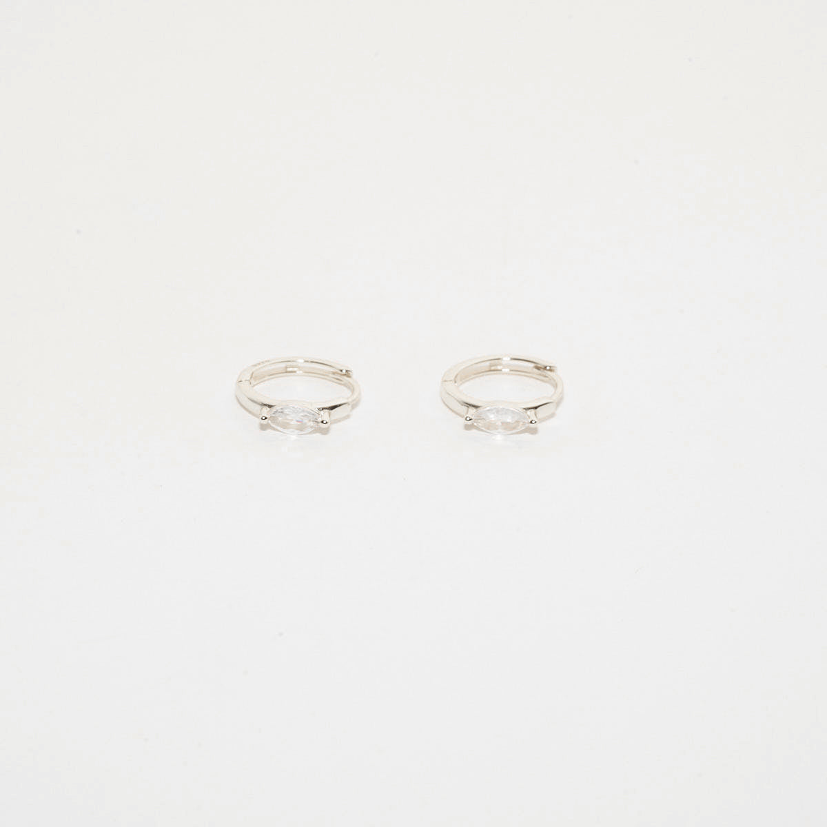 Marquise Crystal Huggie Hoops In Silver