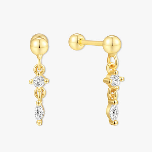 Gold earrings with diamond-like stones on a white background
