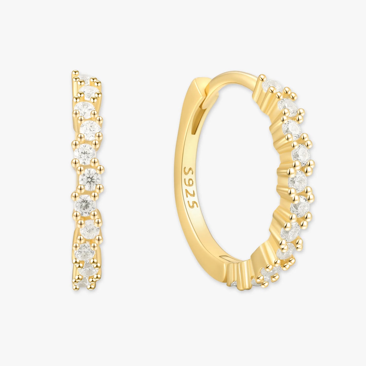 Gold hoop earrings with embedded diamonds on a white background