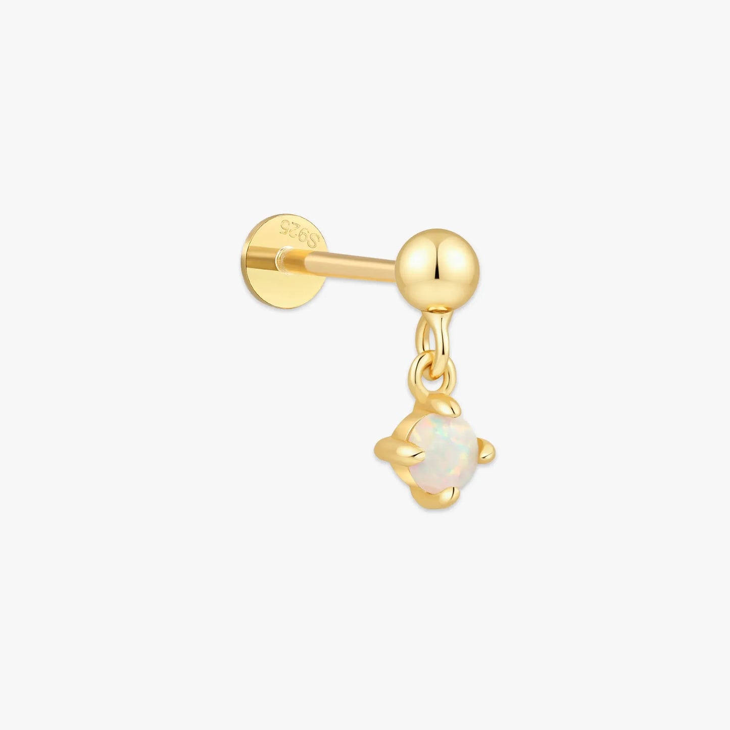 Gold earring with a heart-shaped opal stone on a white background