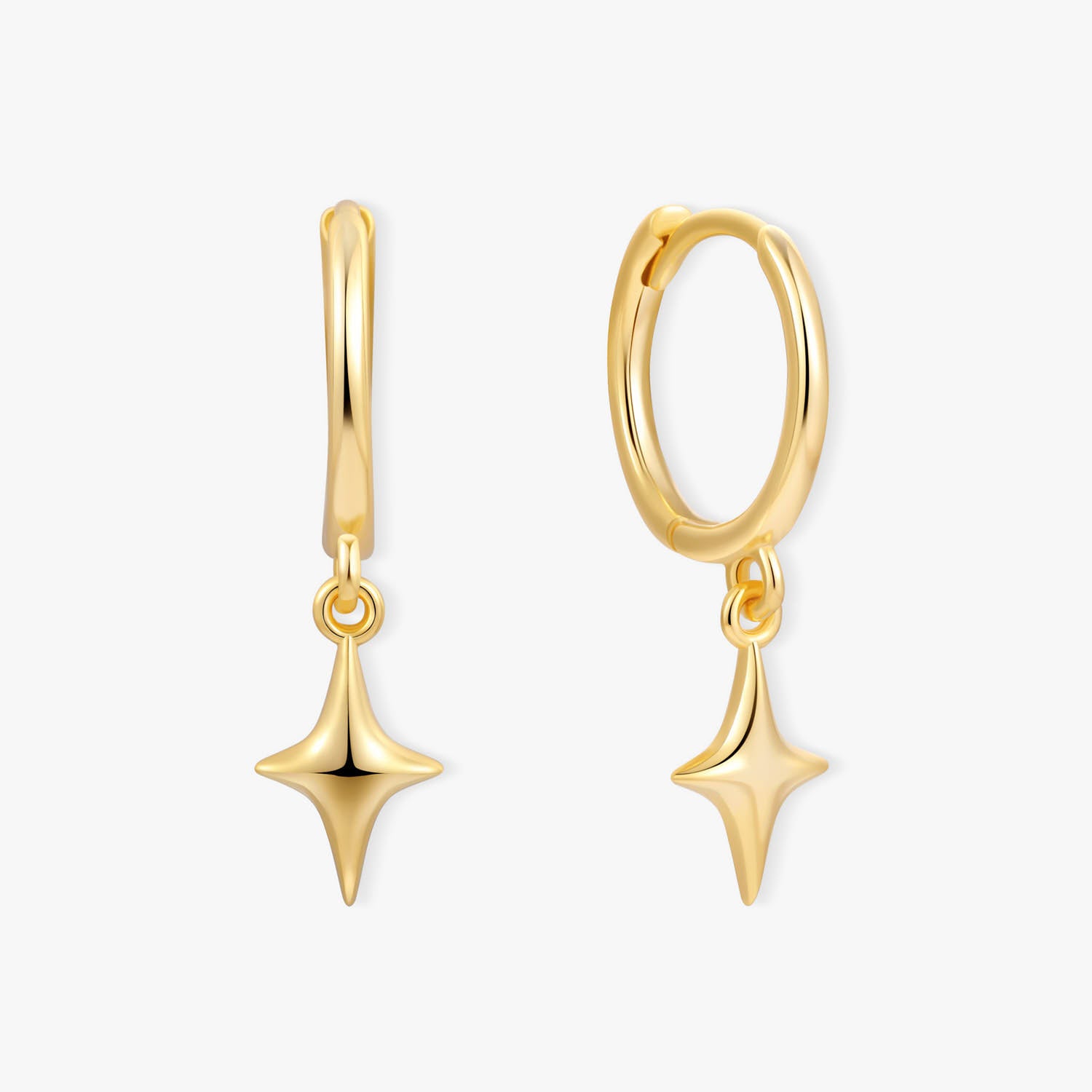 Gold hoop earrings with star-shaped drops on a white background