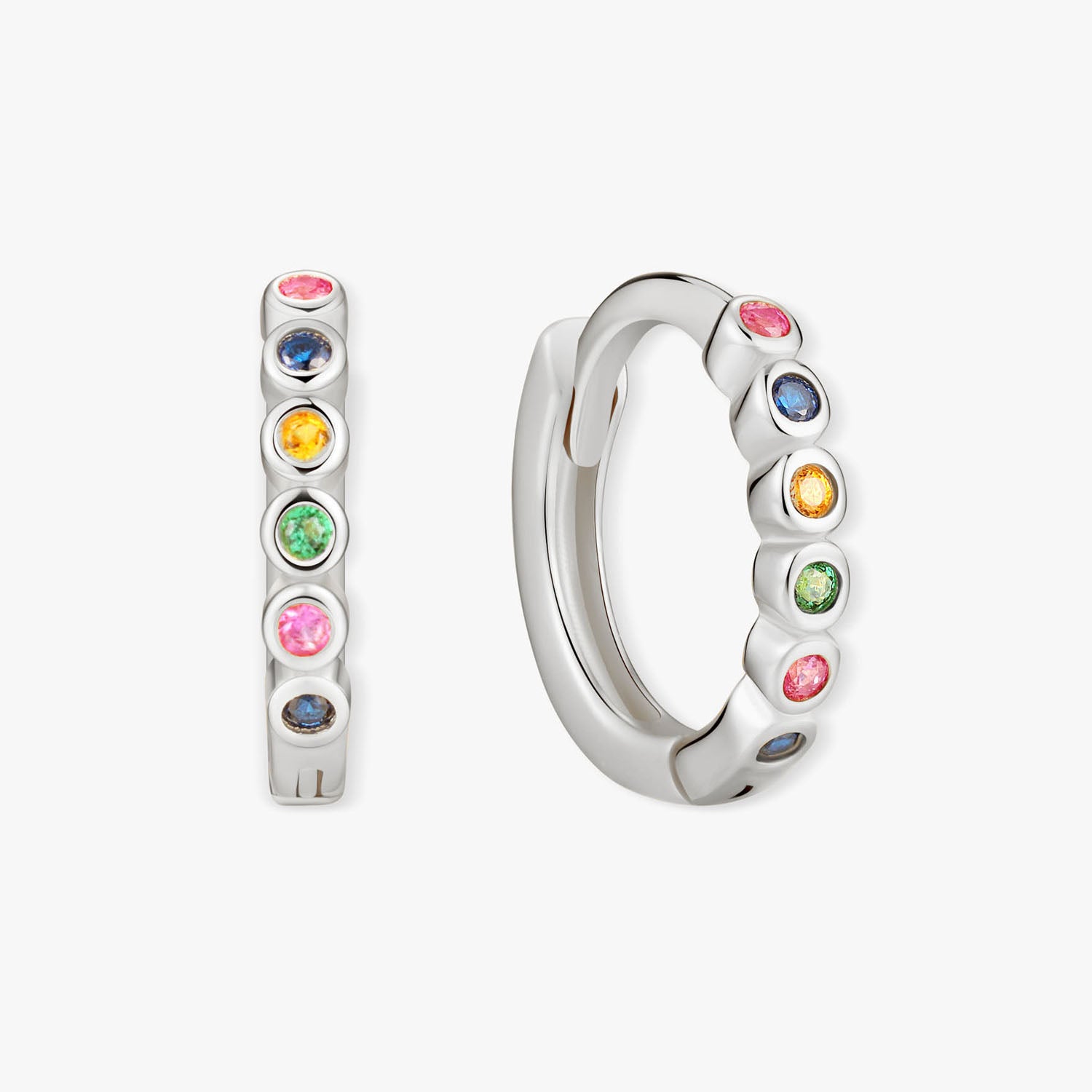 Silver hoop earrings with colorful gemstones on a white background