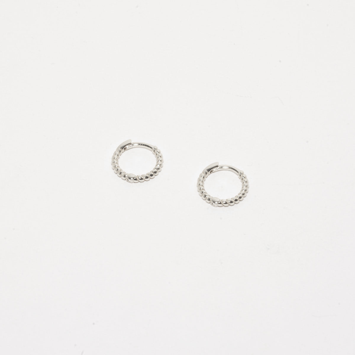 Rope Twist Huggie Hoops In Silver