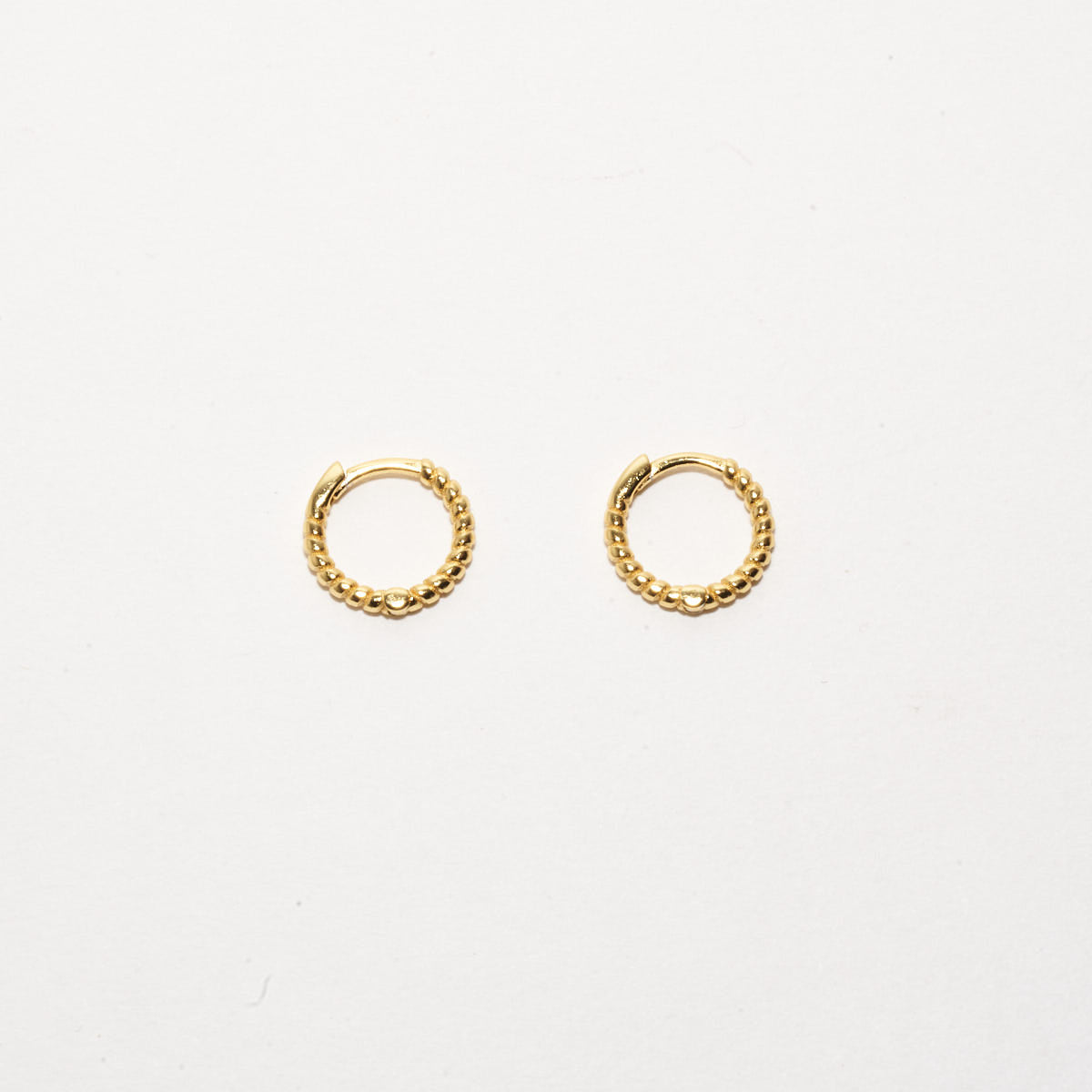 Rope Twist Huggie Hoops In Gold