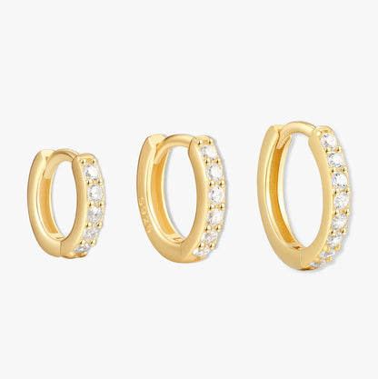 Crystal Paved Huggie Hoops In Gold