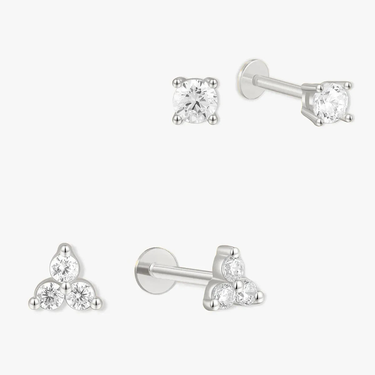 Set of diamond stud earrings on a white background