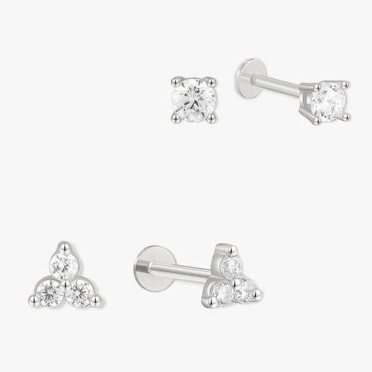 Set of diamond stud earrings on a white background