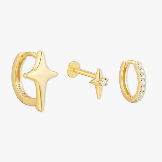 Gold star-shaped earrings on a white background