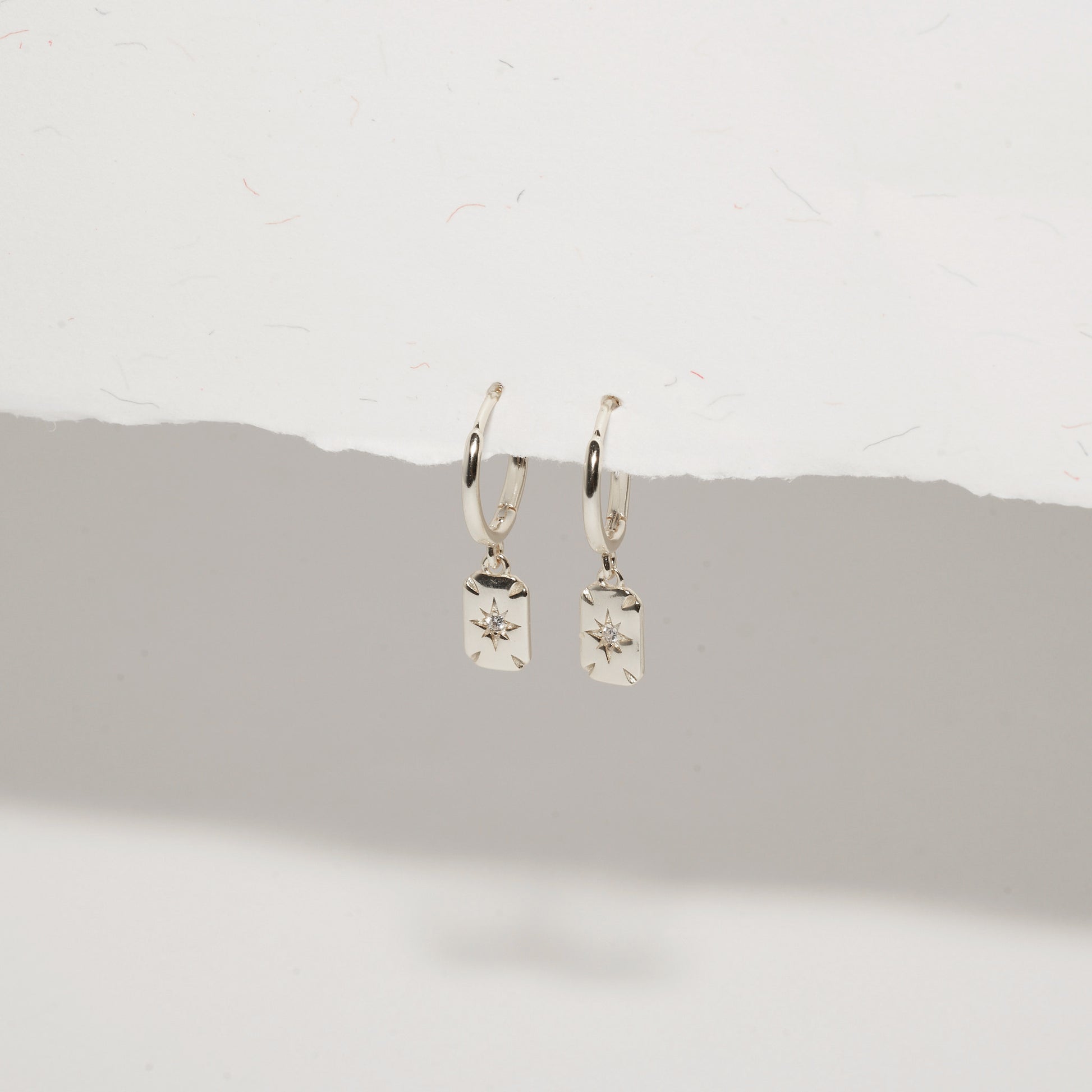 Sun Charm Dangle Earrings in Silver- LÉA