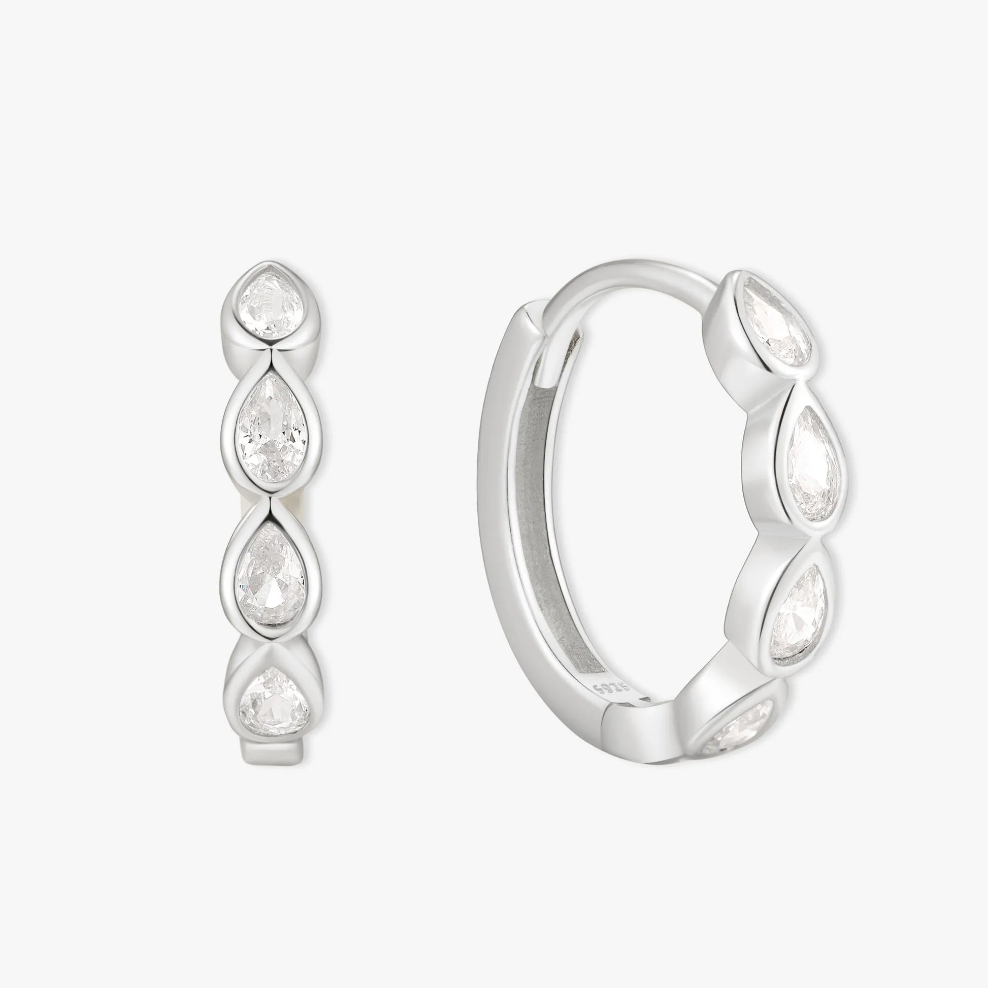 Silver hoop earrings with teardrop-shaped gemstones on a white background