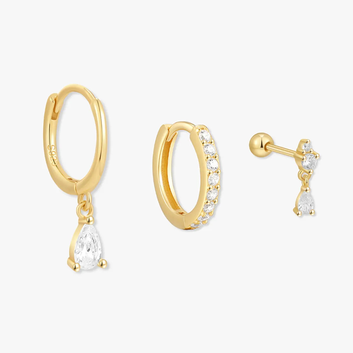 Gold hoop earrings with teardrop-shaped crystals on a white background