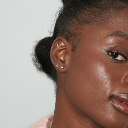 Close-up of a woman's face with a neutral background