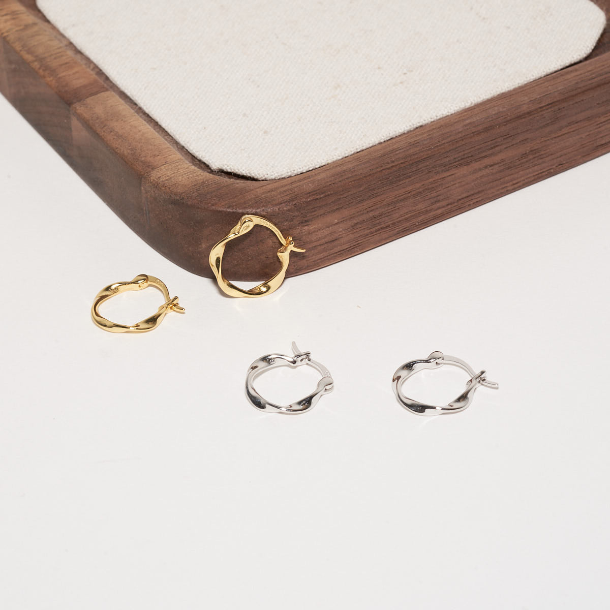 Twisted Hoop Earrings in Silver