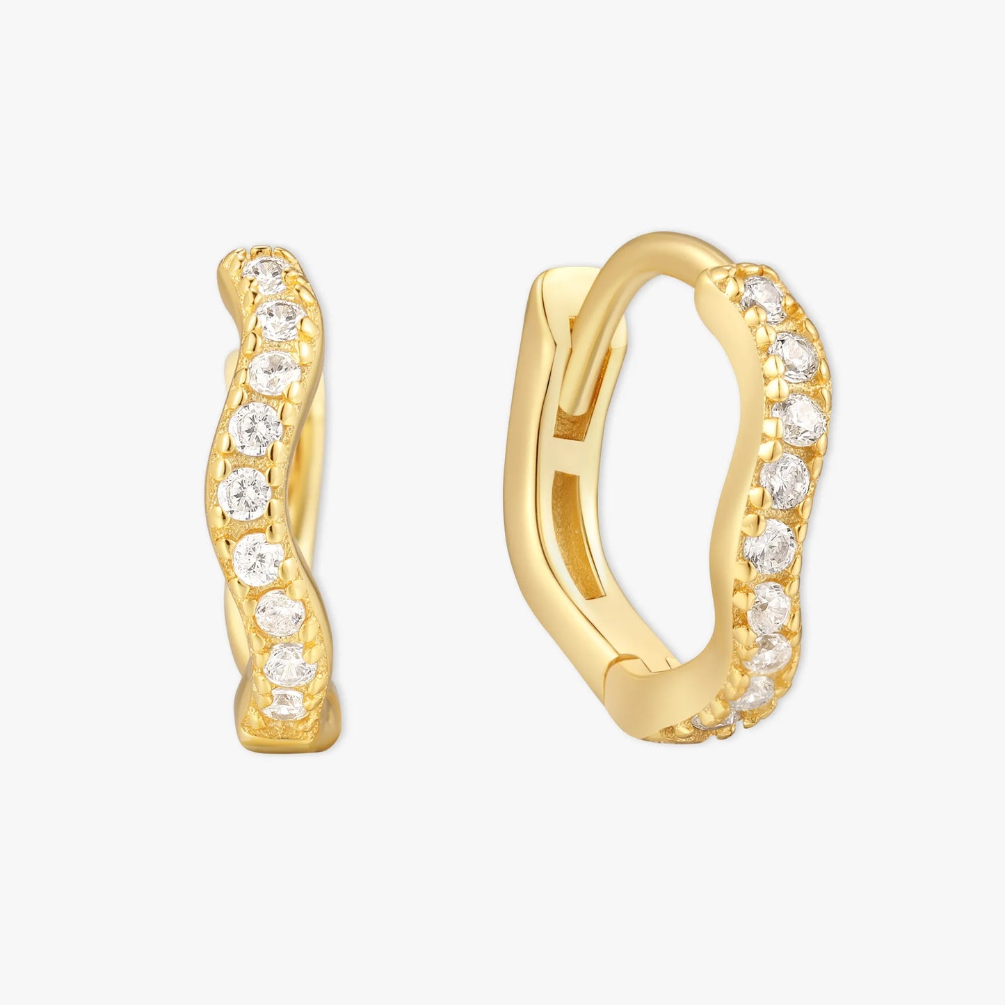 Gold hoop earrings with diamond accents on a white background
