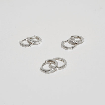 Crystal Paved Huggie Hoops In Silver - LÉA