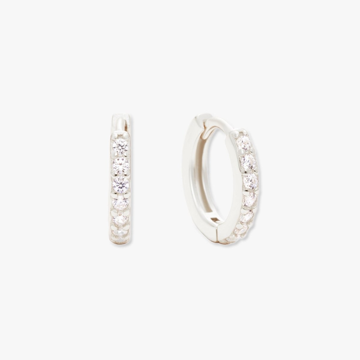 Crystal Paved Huggie Hoops In Silver - LÉA