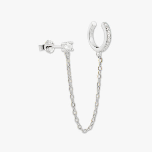 Silver earring with chain on a white background