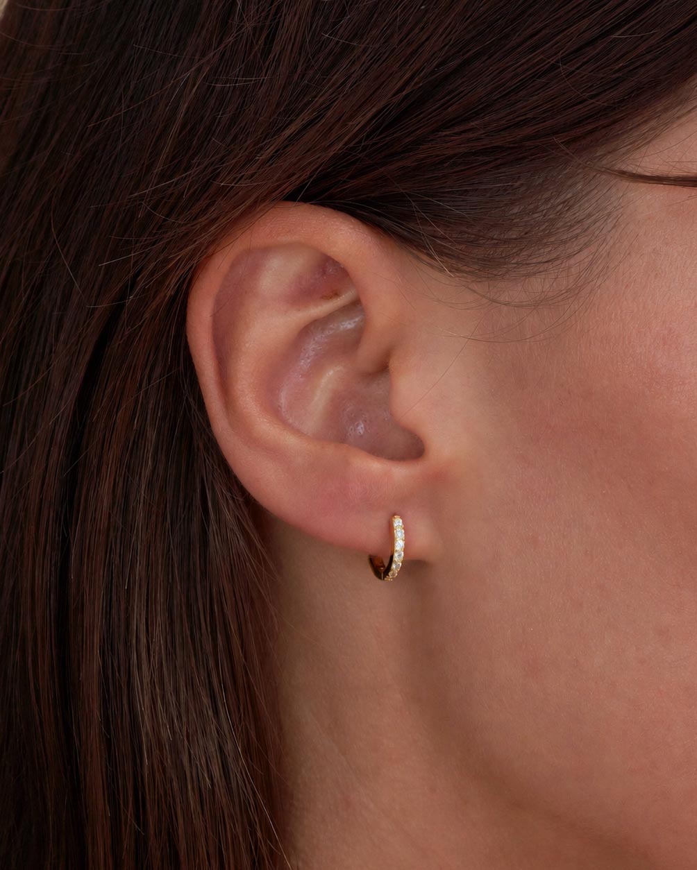 Crystal Paved Huggie Hoops In Gold