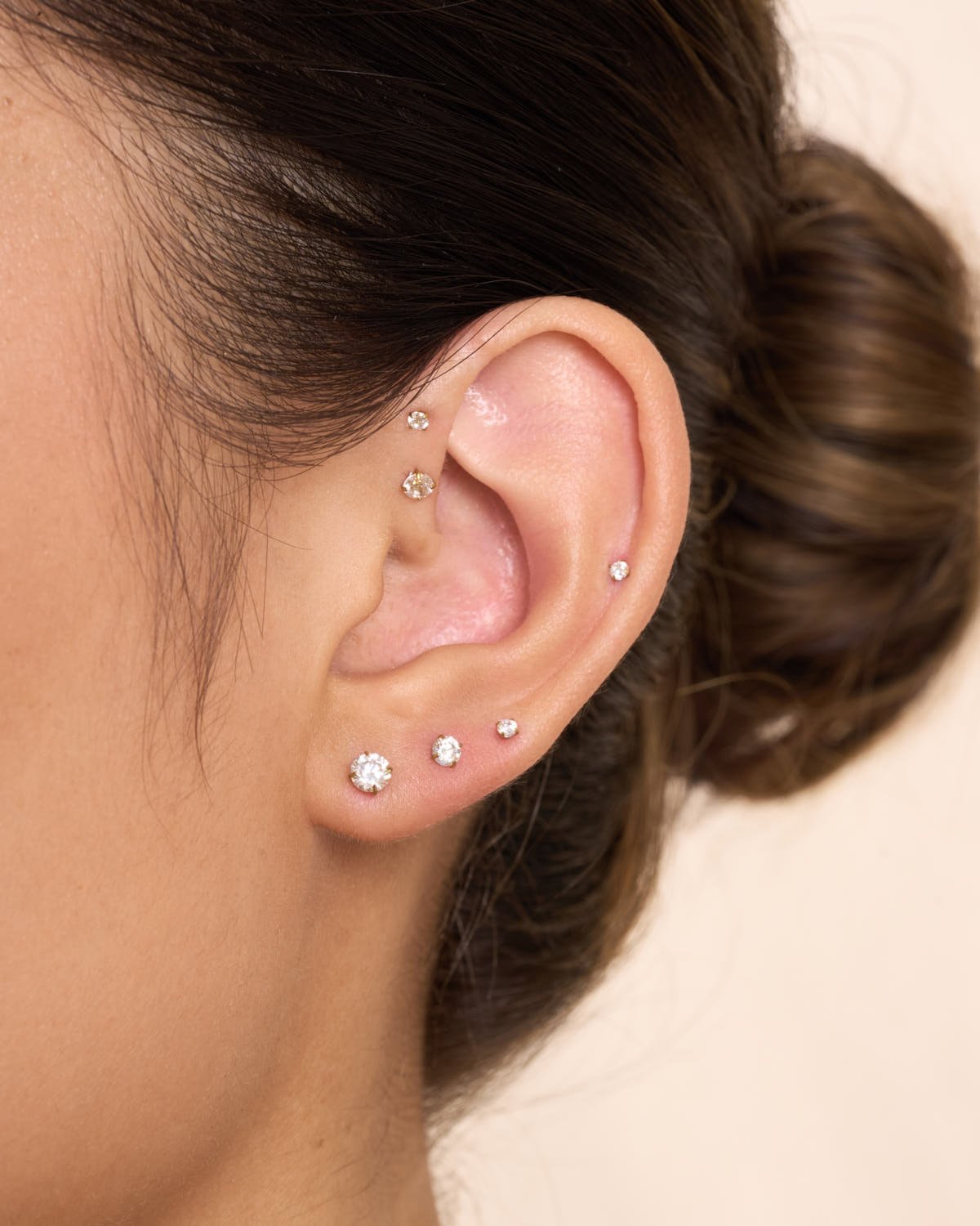 Solitary CZ Titanium Flat Back Studs In Gold