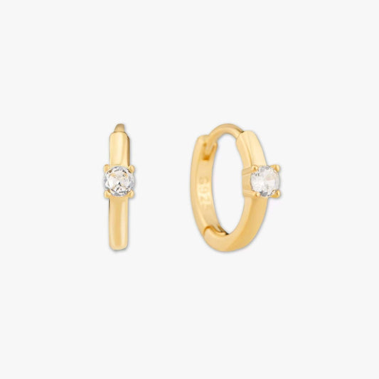Solitaire Crystal Huggie Hoops In Gold - LÉA