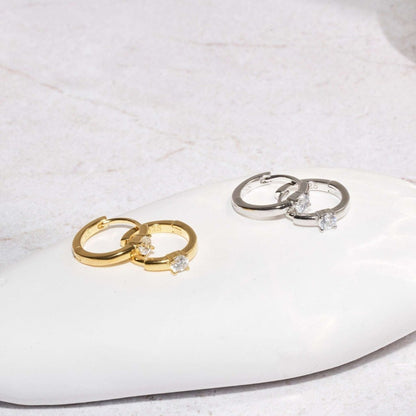 Solitaire Crystal Huggie Hoops In Silver - LÉA