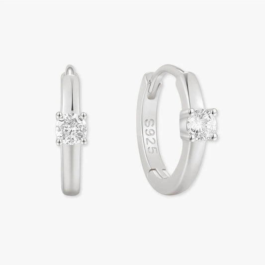 Solitaire Crystal Huggie Hoops In Silver - LÉA
