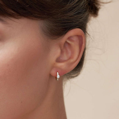 Solitaire Crystal Huggie Hoops In Silver - LÉA