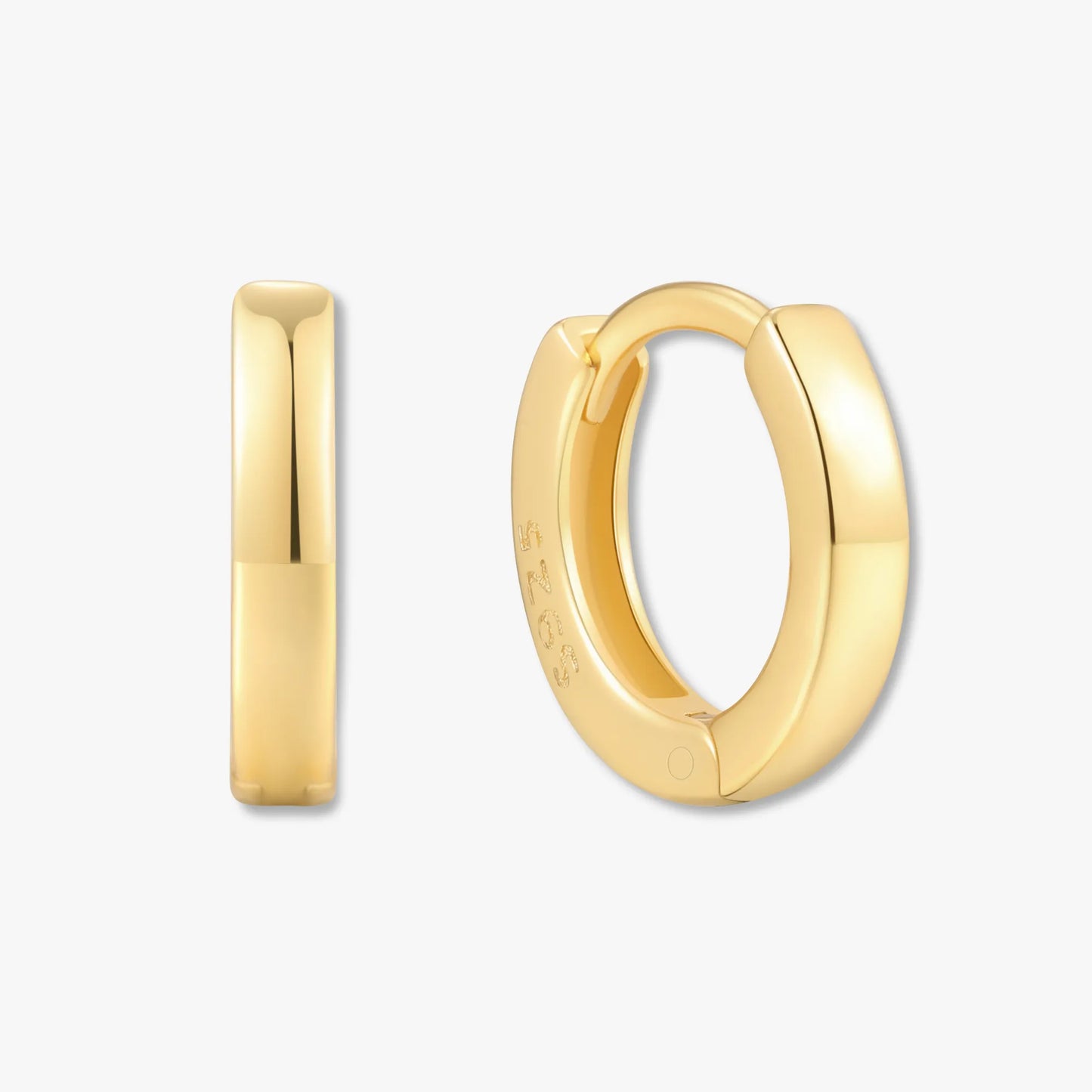 Gold hoop earrings on a white background